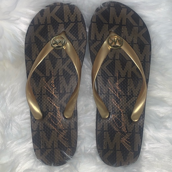 Michael Kors Shoes - Michael Kors Monogram Flip Flops Size 9 NWOT